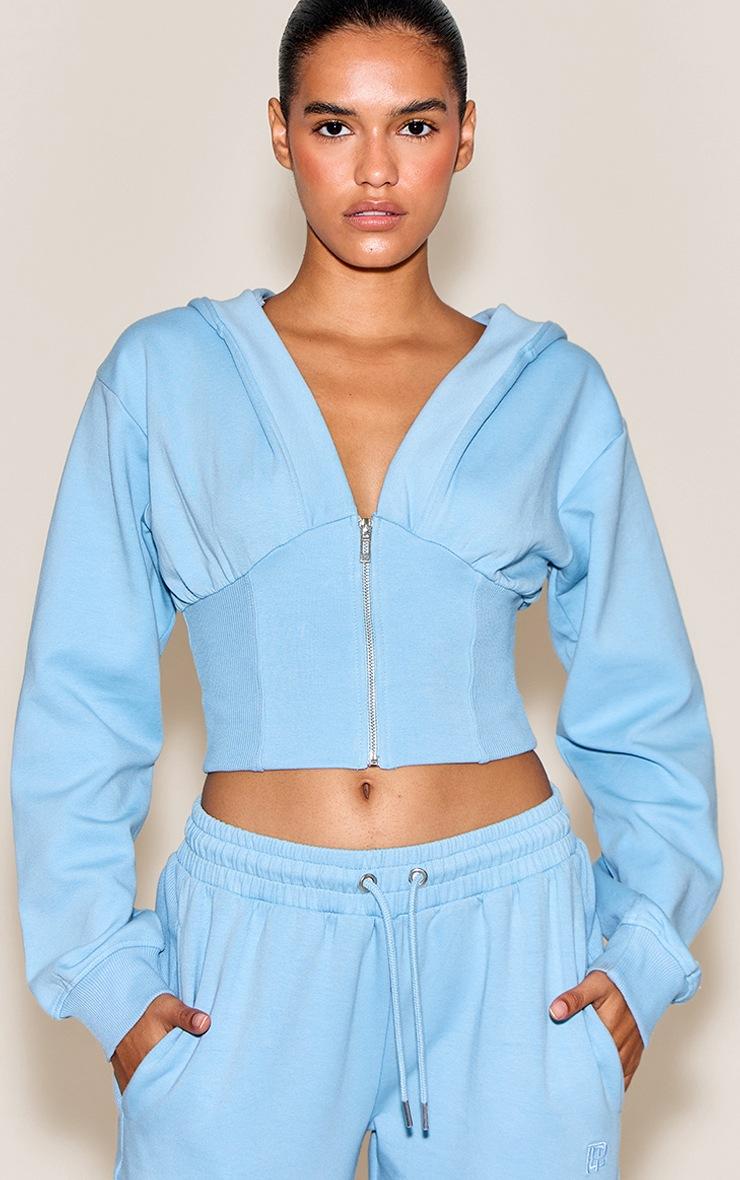 Pretty Little Thing Baby Blue Embroidered Interlock Cinch Waist Zip Hoodie