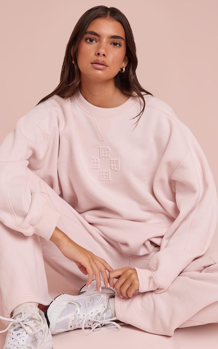 Pretty Little Thing Baby Pink PLT Embossed Crew Neck Sweatshirt