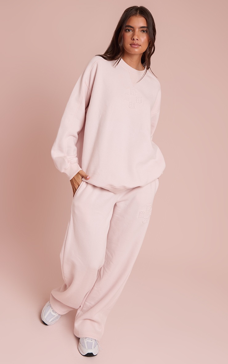 Pretty Little Thing Baby Pink PLT Embossed Wide Leg Sweatpants