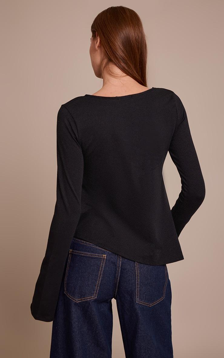 Pretty Little Thing Black Cotton Asymmetric Hem Flared Long Sleeve Top