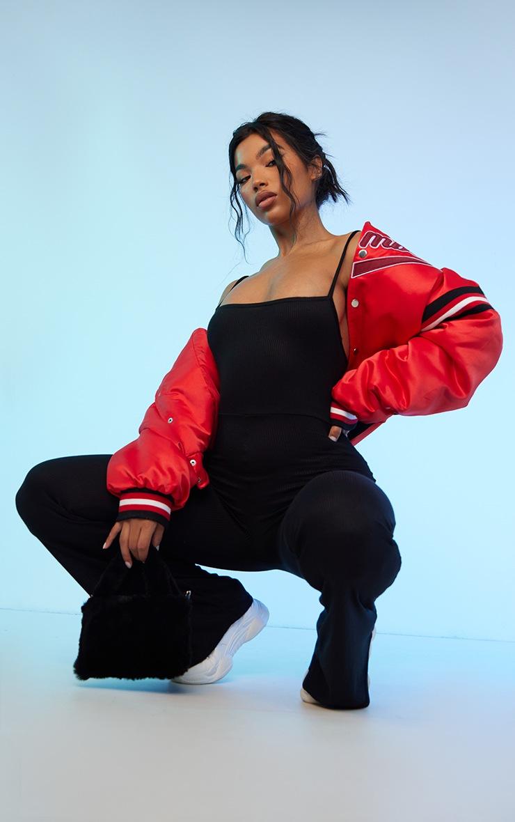 Pretty Little Thing Black Ribbed Strappy Square Neck Flared Jumpsuit