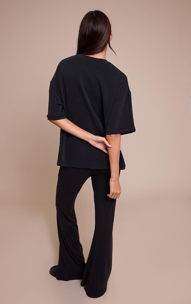 Pretty Little Thing Black Ultra Soft Flared Leg Pant