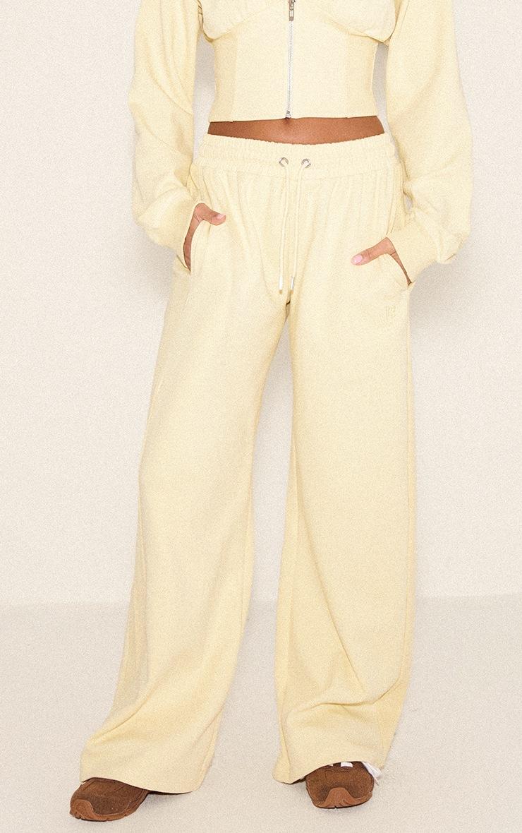Pretty Little Thing Buttercream Embroidered Interlock Rib Panel Wide Leg Sweatpants