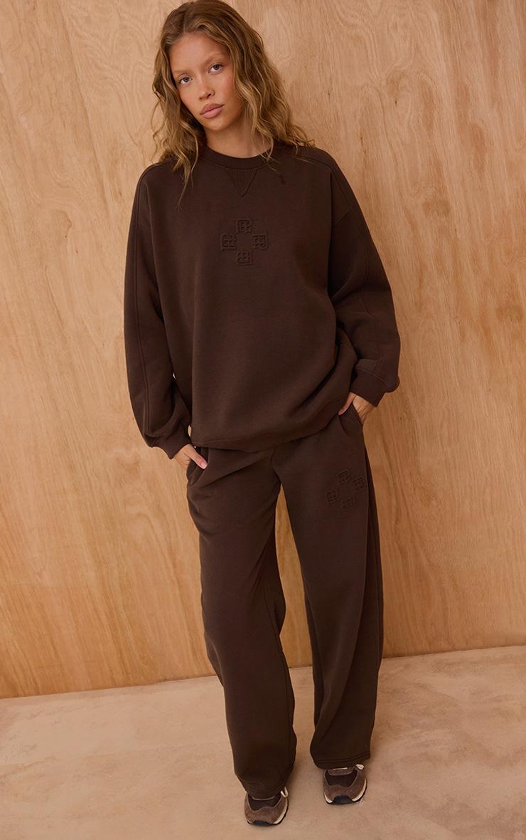 Pretty Little Thing Chocolate PLT Embossed Crew Neck Sweatshirt