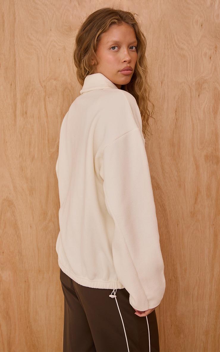 Pretty Little Thing Cream Contrast Binding Zip Up Fleece