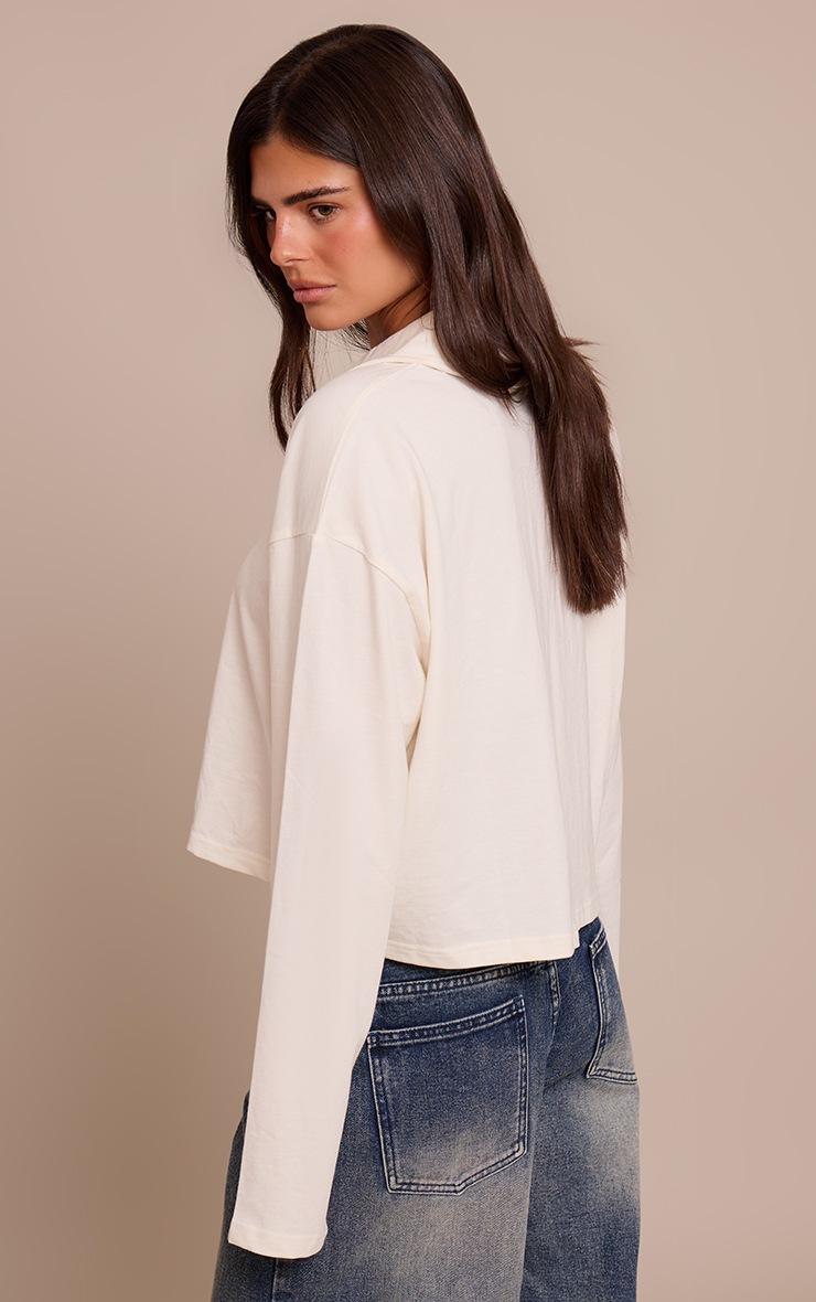 Pretty Little Thing Cream Cotton Polo Collar Long Sleeve Cropped Top