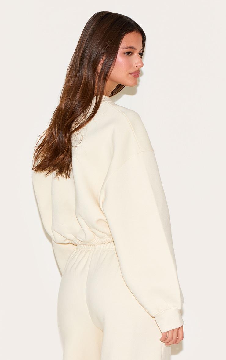 Pretty Little Thing Cream Drawcord Waist Cropped Zip Up Sweatshirt
