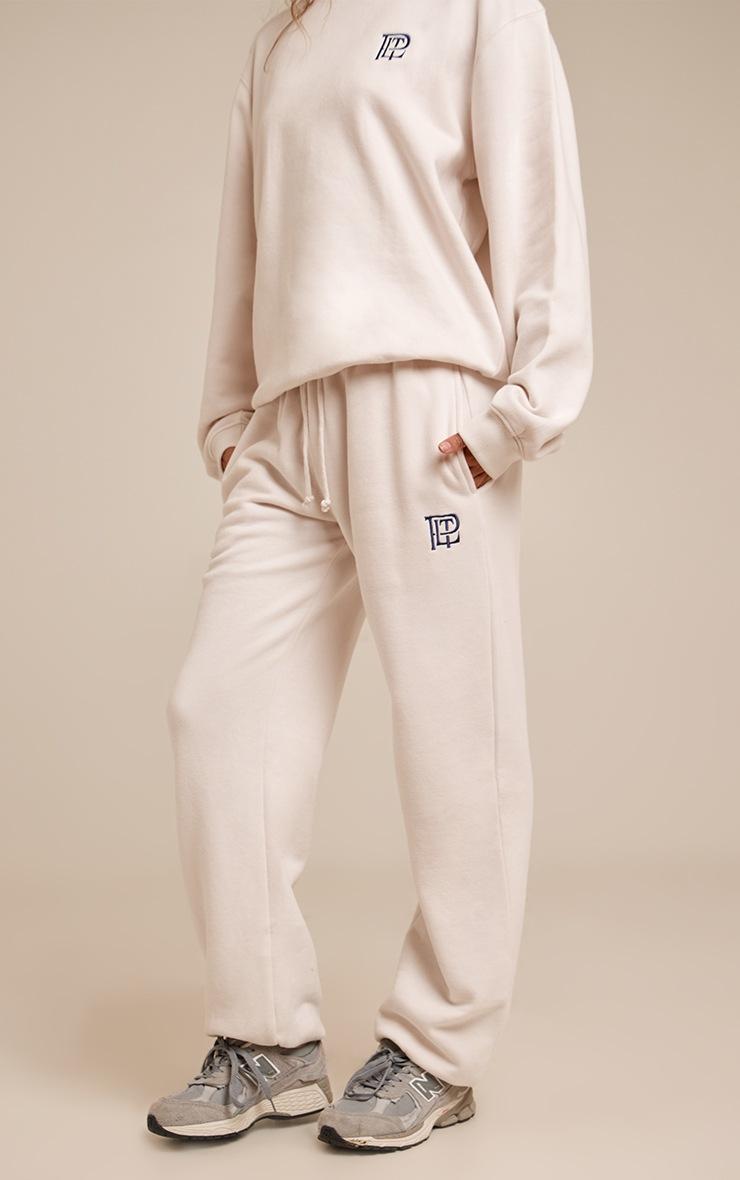 Pretty Little Thing Cream PLT Embroidered Cotton Fleece Cuffed Sweat Pants