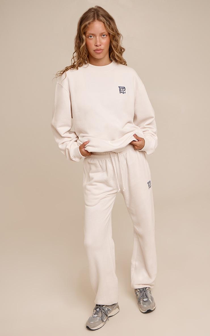 Pretty Little Thing Cream PLT Embroidered Cotton Fleece Cuffed Sweat Pants