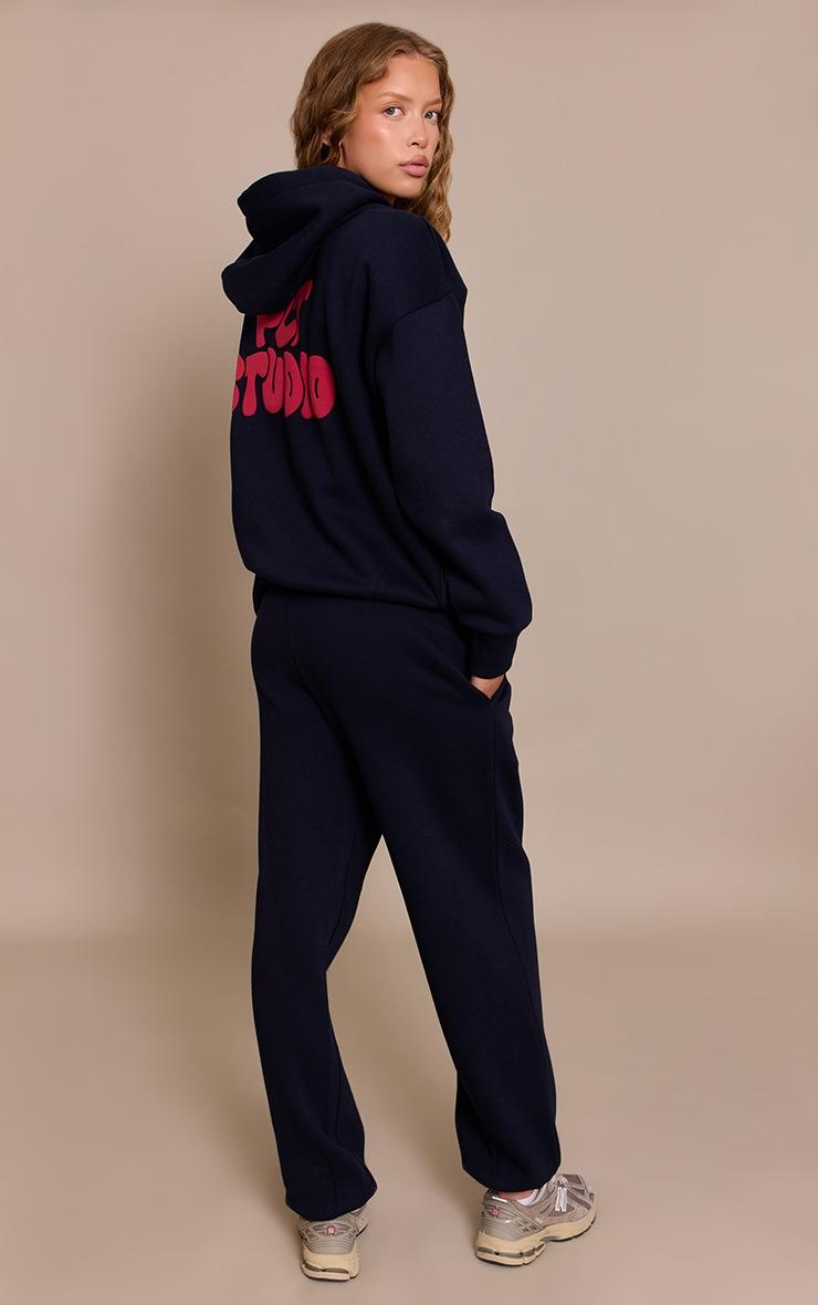 Pretty Little Thing Dark Navy PLT Studio Print Cuffed Sweatpants