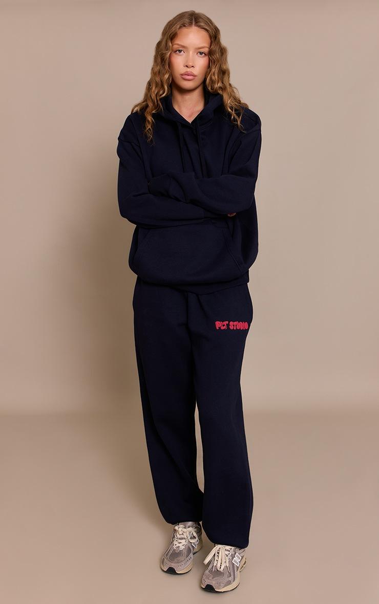 Pretty Little Thing Dark Navy PLT Studio Print Cuffed Sweatpants