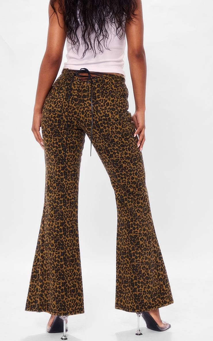 Pretty Little Thing Leopard Dipped Lace Up Back Flared Denim Jean