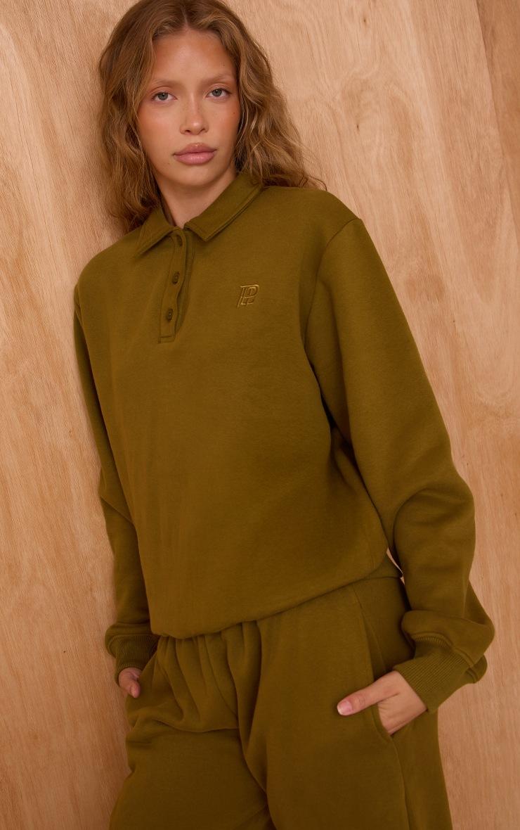 Pretty Little Thing Olive Cotton Fleece Polo Sweatshirt