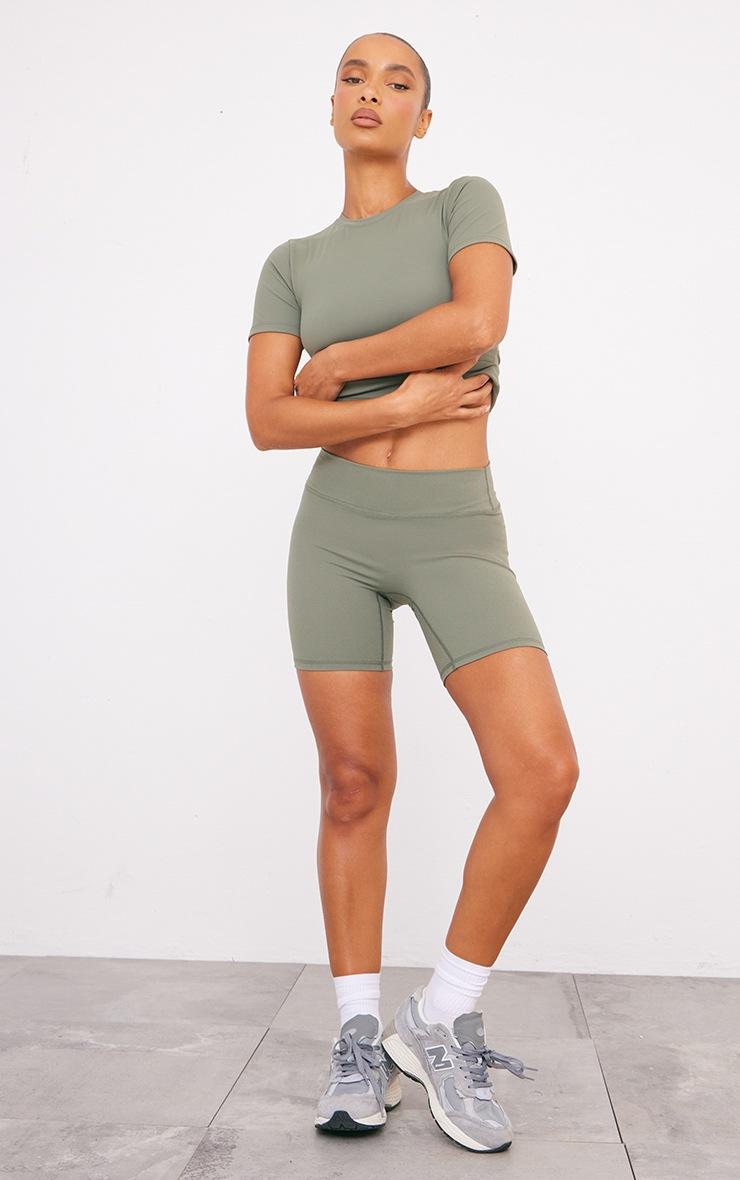 Pretty Little Thing Olive Ultimate Sculpt Longline Short Sleeve Gym Top