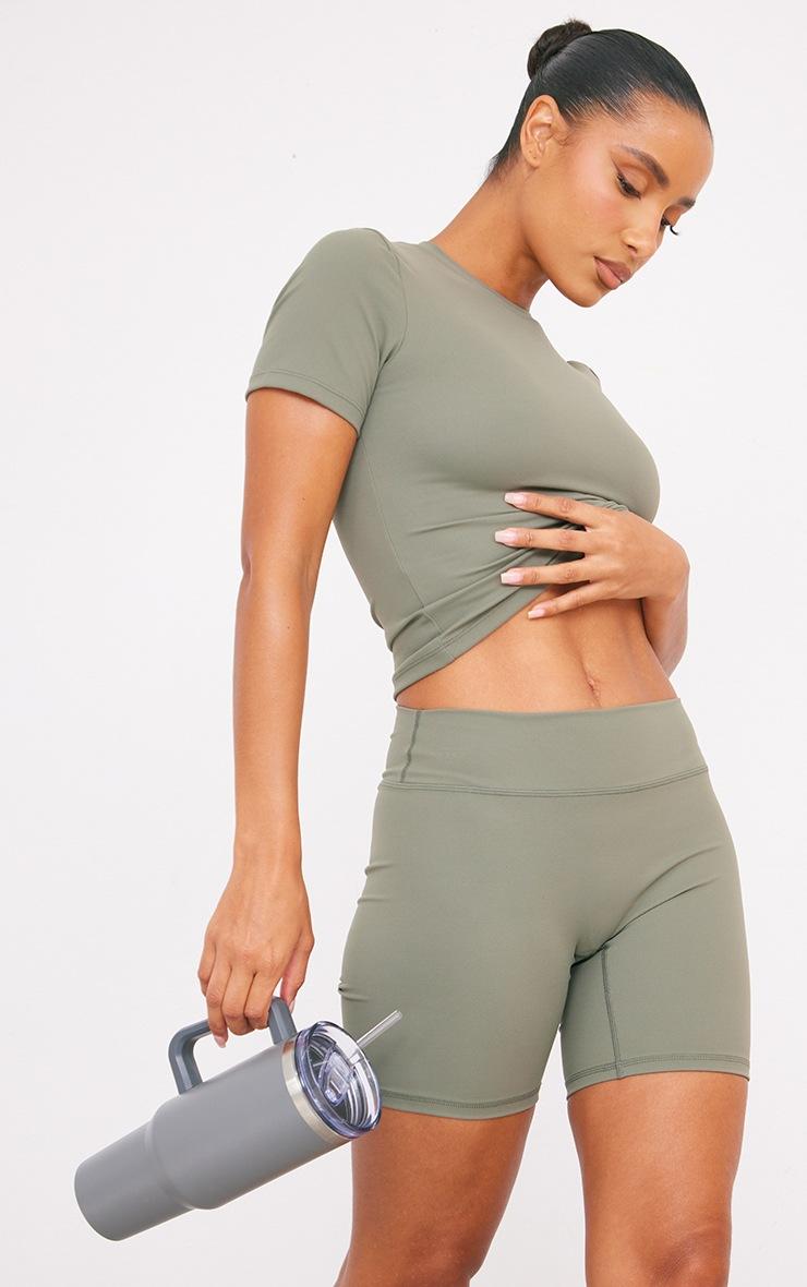 Pretty Little Thing Olive Ultimate Sculpt Longline Short Sleeve Gym Top