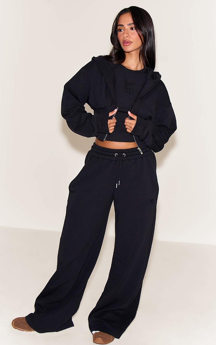 Pretty Little Thing Petite Black Embroidered Interlock Rib Panel Wide Leg Sweatpants
