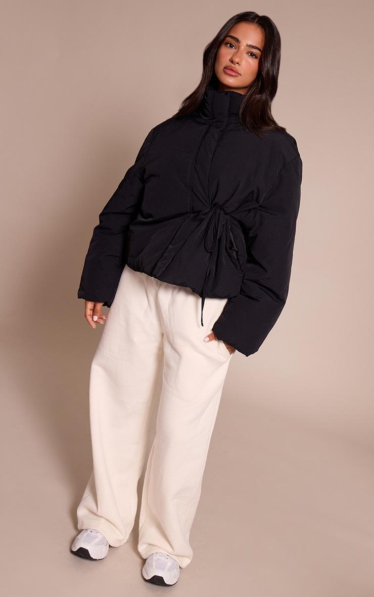 Pretty Little Thing Petite Black High Neck Tie Waist Quilted Jacket
