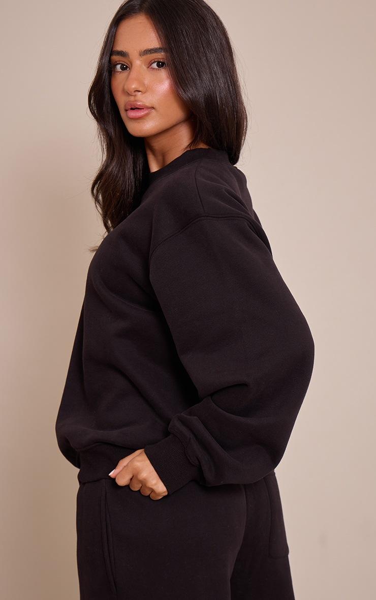 Pretty Little Thing Petite Black Oversized Crew Sweatshirt