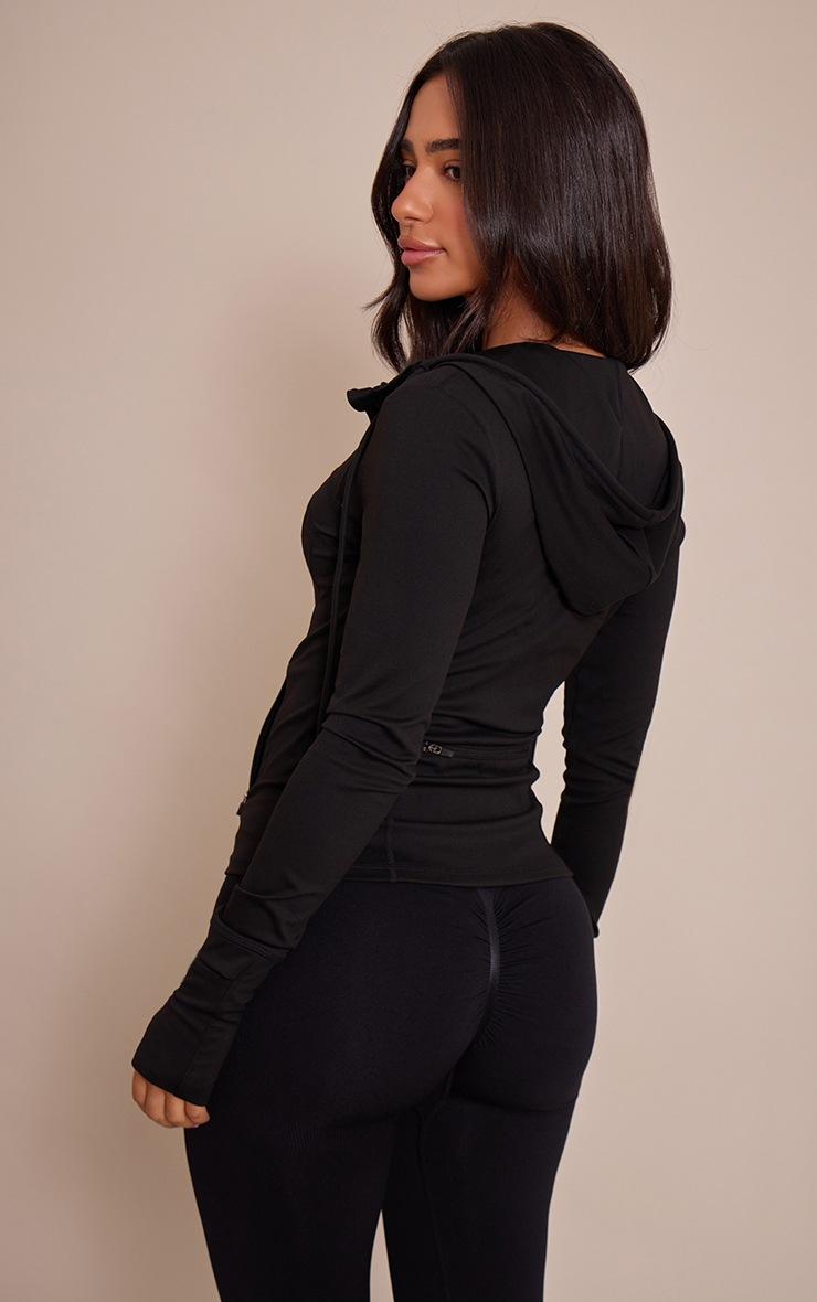 Pretty Little Thing Petite Black Sculpt Seam Detail Drawstring Gym Jacket