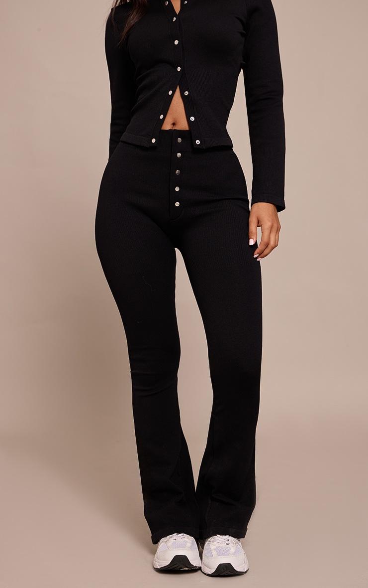 Pretty Little Thing Petite Black Snatched Rib Button Detail Flare Leggings