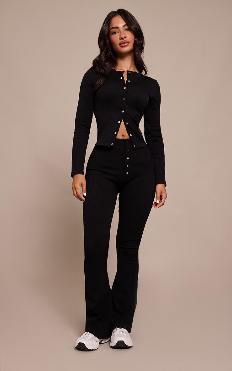Pretty Little Thing Petite Black Snatched Rib Button Detail Flare Leggings