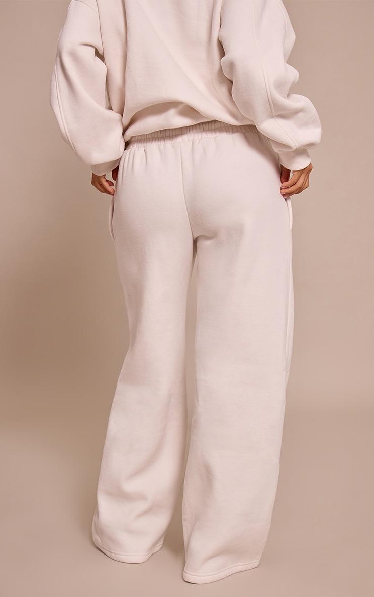Pretty Little Thing Petite Cream PLT Embossed Wide Leg Sweatpants