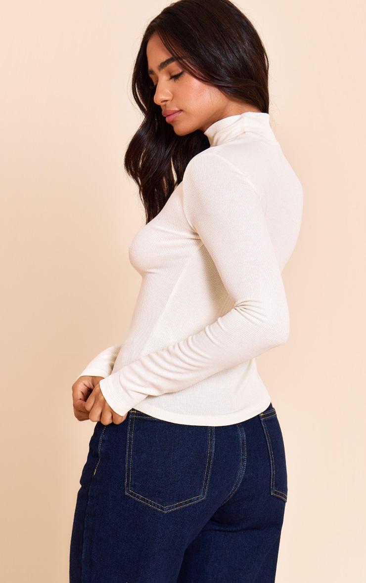 Pretty Little Thing Petite Cream Soft Rib High Neck Fitted Long Sleeved Top