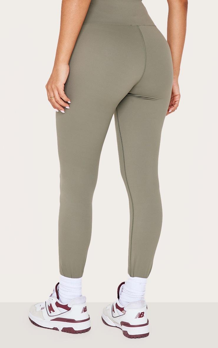 Pretty Little Thing Petite Olive Sculpt Wrap Waist Gym Leggings