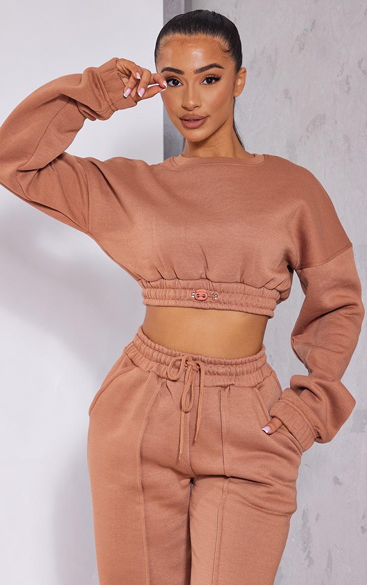 Pretty Little Thing Petite Tan Crop Elasticated Hem Sweat Top