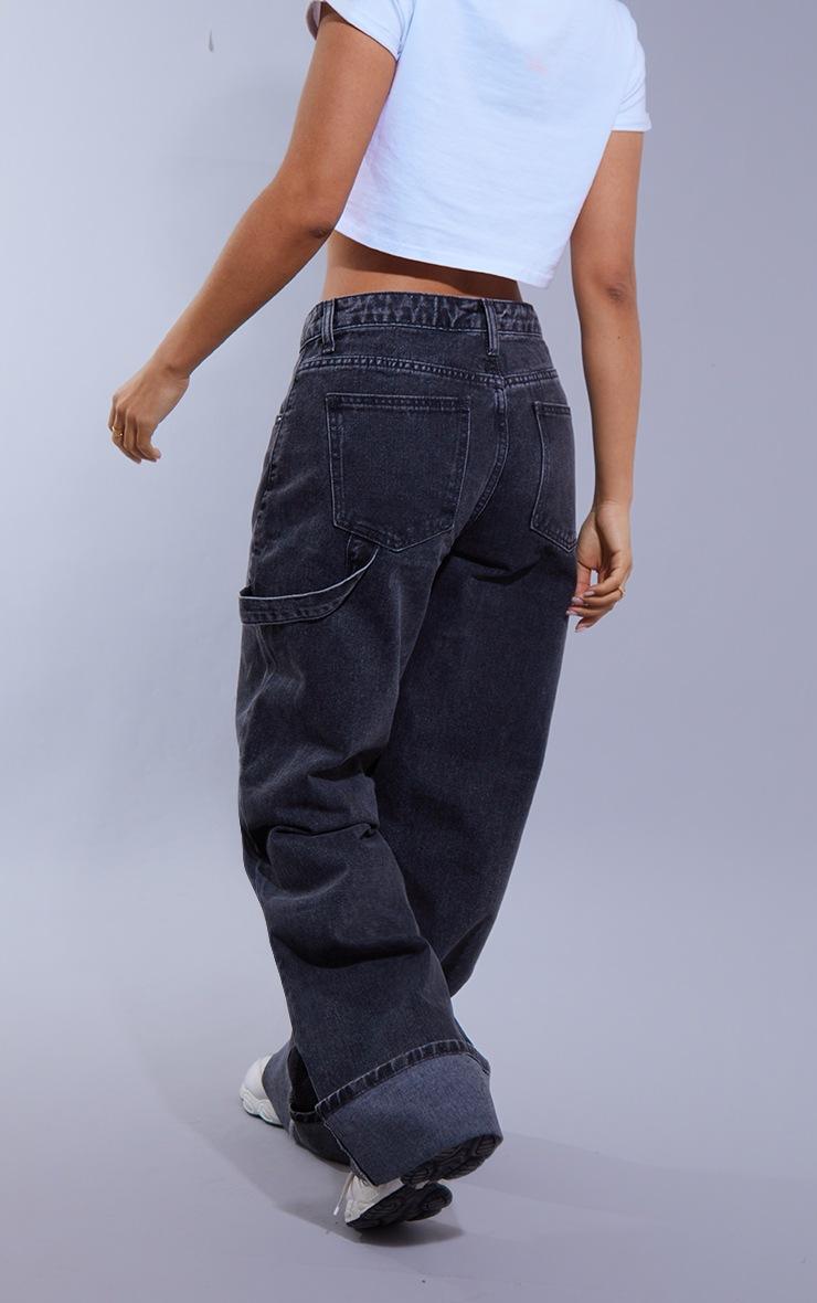 Pretty Little Thing Petite Washed Black Wide Leg Jeans With Strap Detail