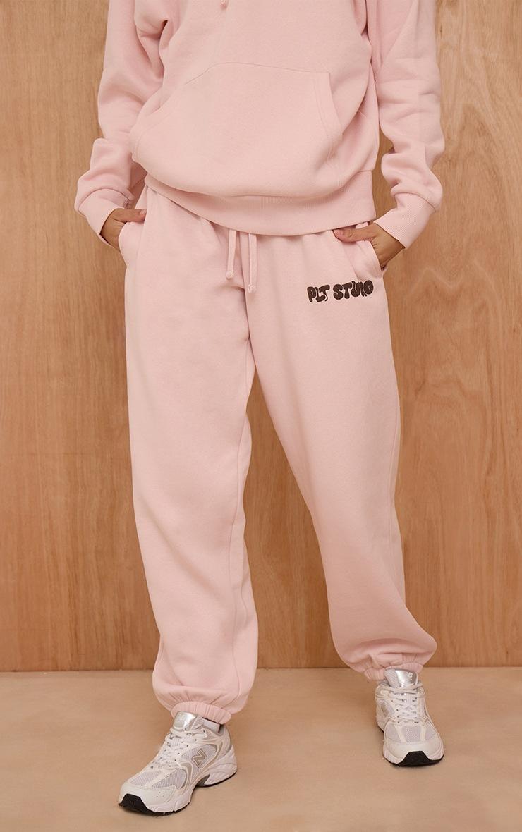 Pretty Little Thing Pink PLT Studio Print Cuffed Sweatpants