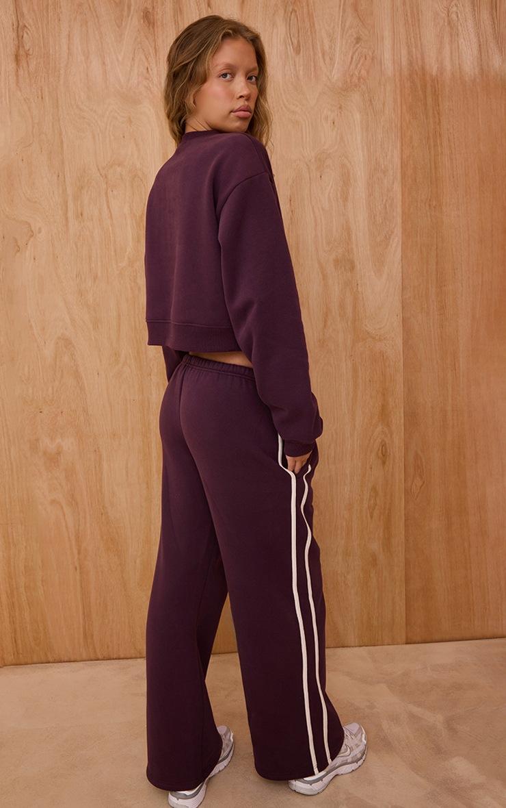 Pretty Little Thing Plum Sports Club Print Wide Leg Sweatpants