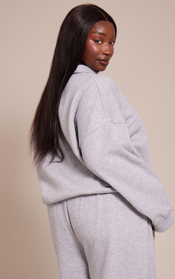 Pretty Little Thing Plus Grey Marl Button Up Long Sleeve Polo Sweatshirt