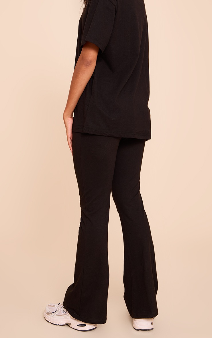 Pretty Little Thing PRETTYLITTLETHING Black Printed Flared Pants