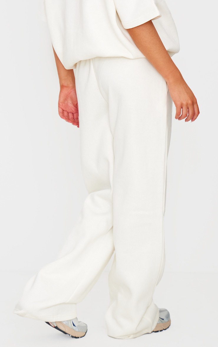 Pretty Little Thing PRETTYLITTLETHING Cream Badge Detail Mid Rise Wide Leg Sweatpants
