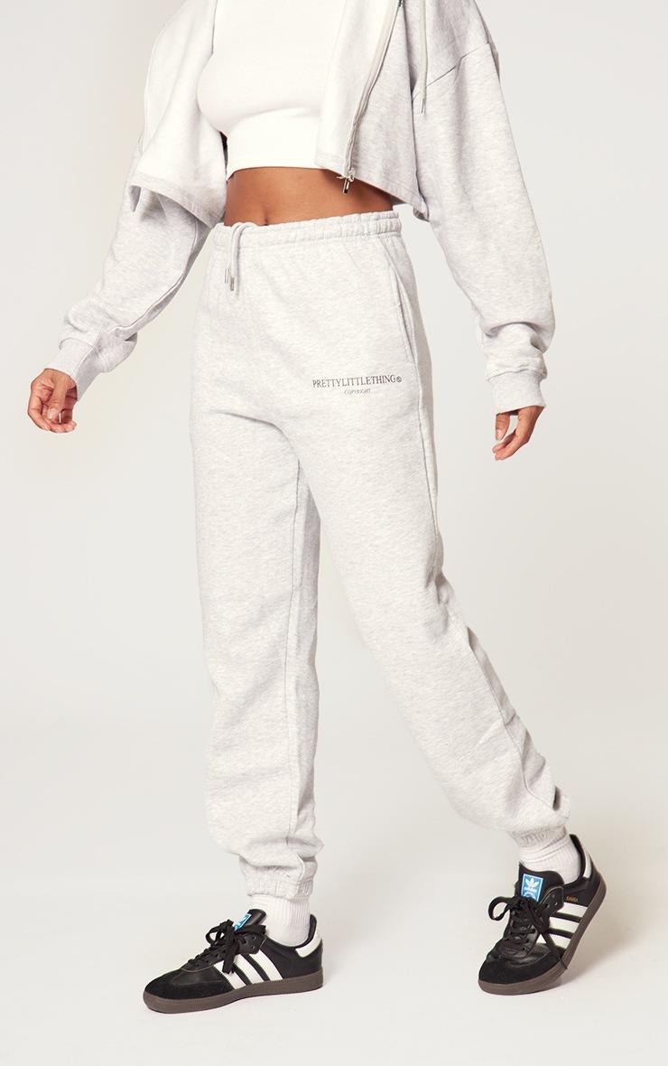 Pretty Little Thing PRETTYLITTLETHING Grey Marl Copy Right Graphic Sweatpants