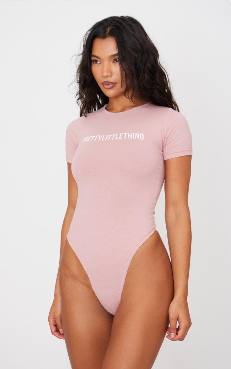 Pretty Little Thing PRETTYLITTLETHING Light Pink Logo Short Sleeve Bodysuit