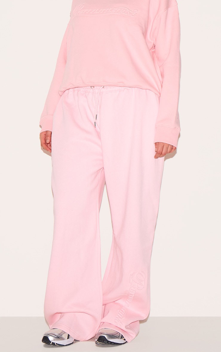 Pretty Little Thing PRETTYLITTLETHING Plus Baby Pink Embossed Graphic Straight Leg Sweatpants
