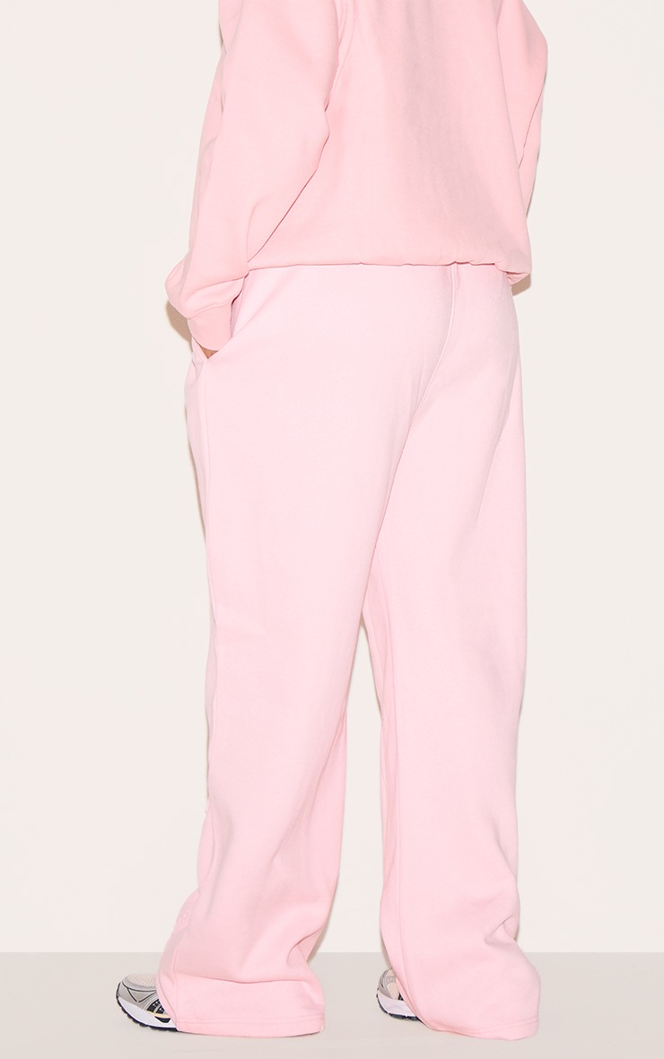 Pretty Little Thing PRETTYLITTLETHING Plus Baby Pink Embossed Graphic Straight Leg Sweatpants
