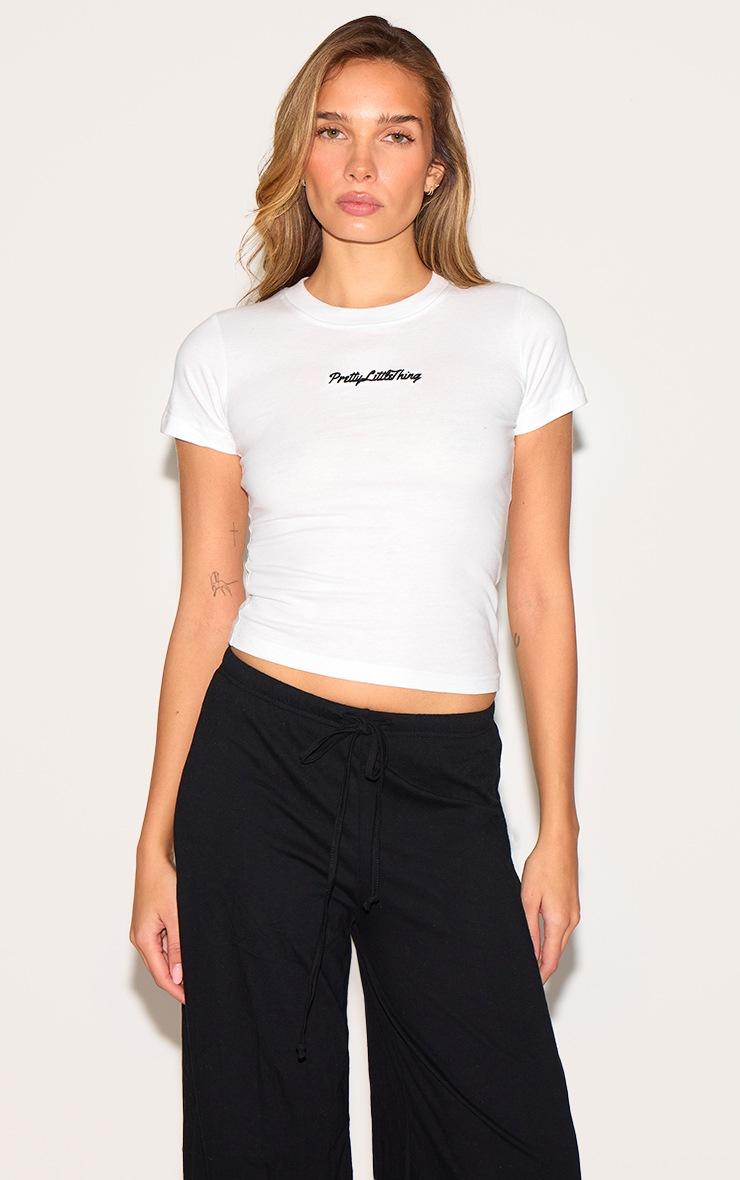 Pretty Little Thing PRETTYLITTLETHING White Plt Embroidered Baby Doll Tee