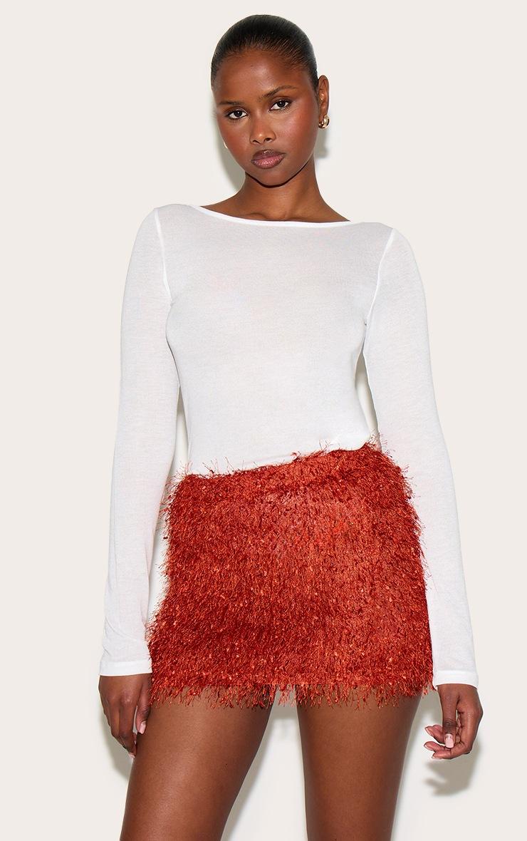 Pretty Little Thing Rust Textured Tassel Mini Skirt
