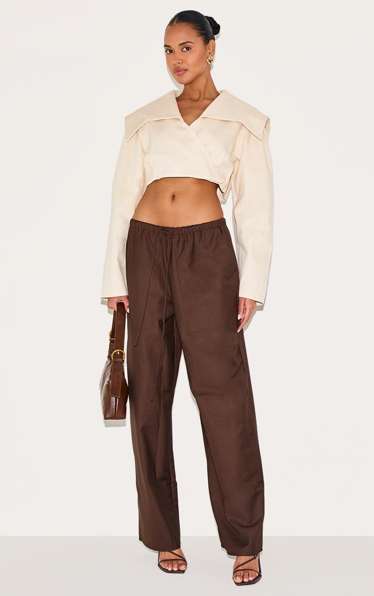 Pretty Little Thing Sand Cross Over Asymmetric Cropped Jacket