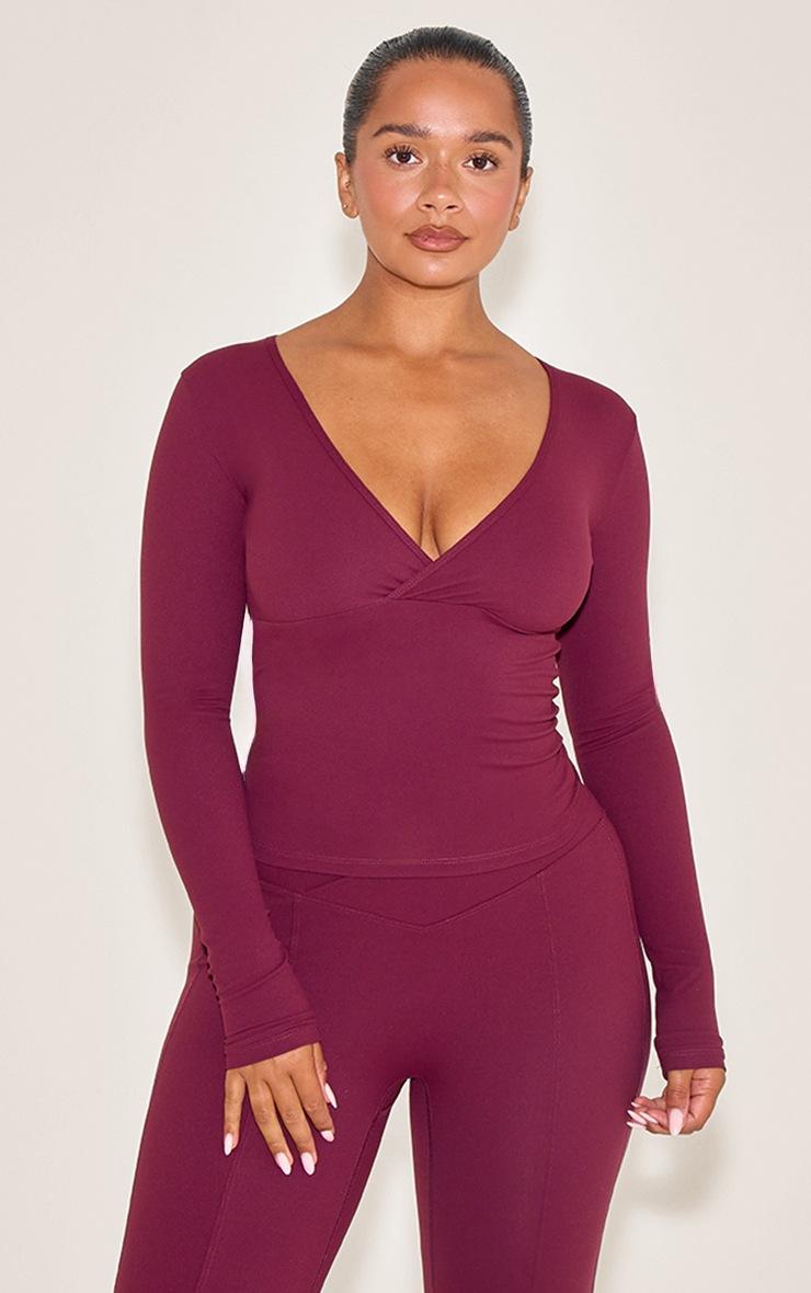Pretty Little Thing Shape Wine Sculpt Active Wrap V Neck Long Sleeve Top