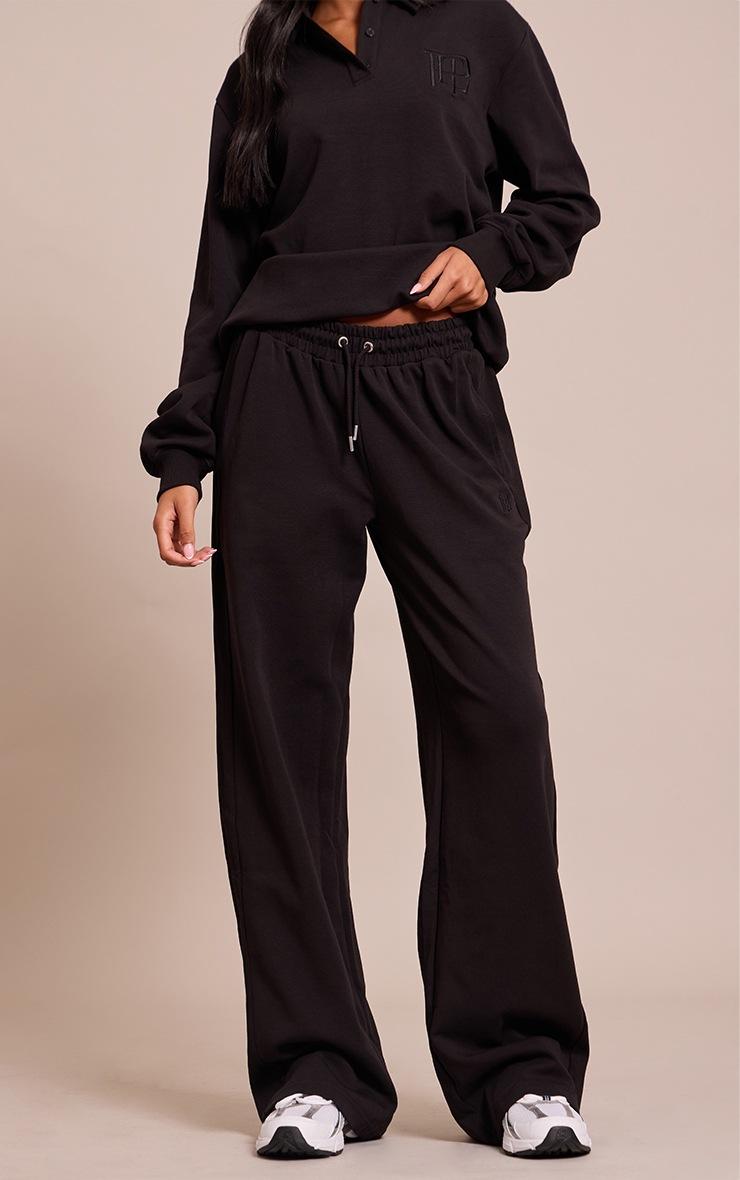 Pretty Little Thing Tall Black Embroidered Interlock Rib Panel Wide Leg Sweatpants