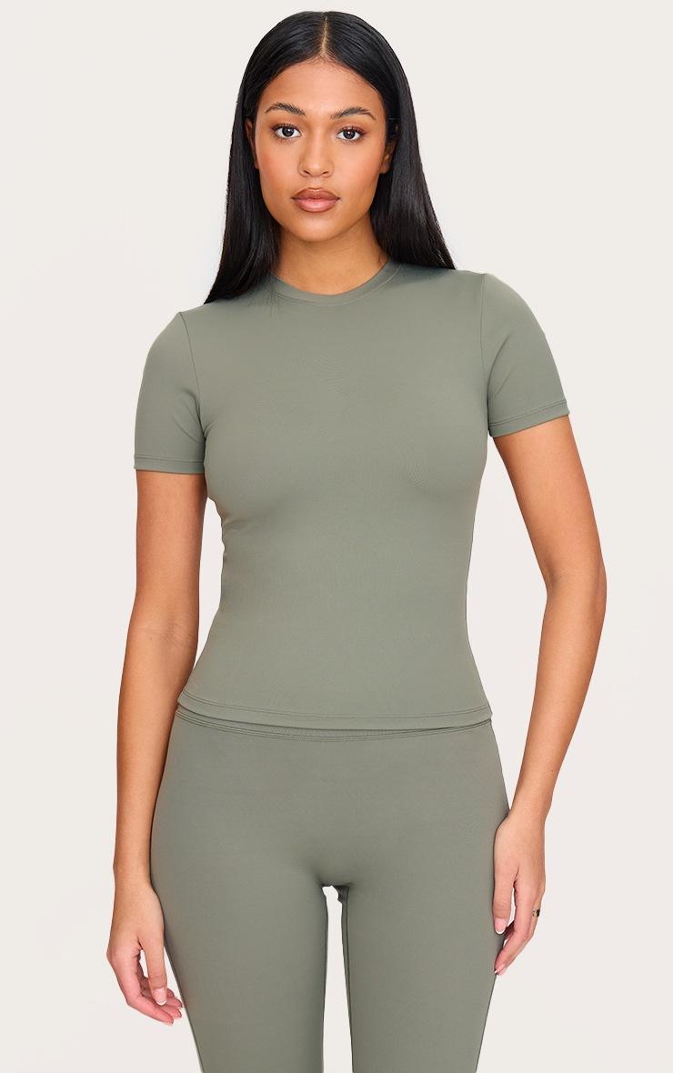 Pretty Little Thing Tall Olive Sculpt Longline Short Sleeved Gym Top