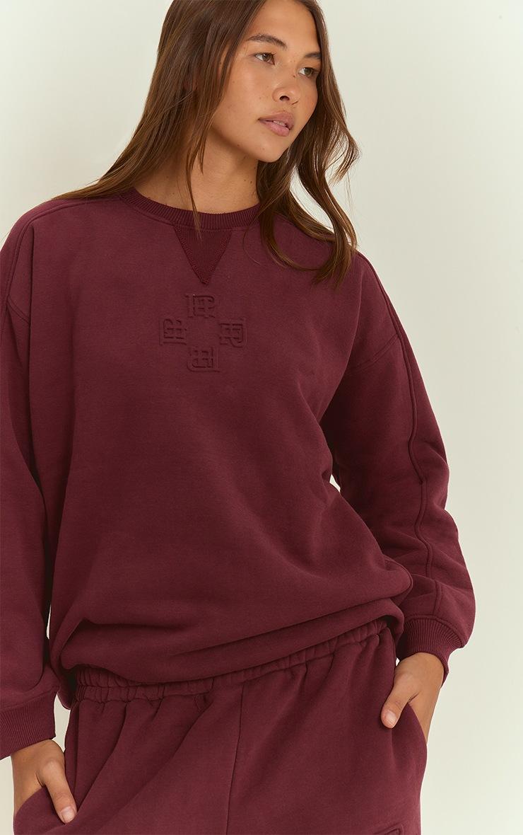 Pretty Little Thing Wine PLT Embossed Crew Neck Sweatshirt