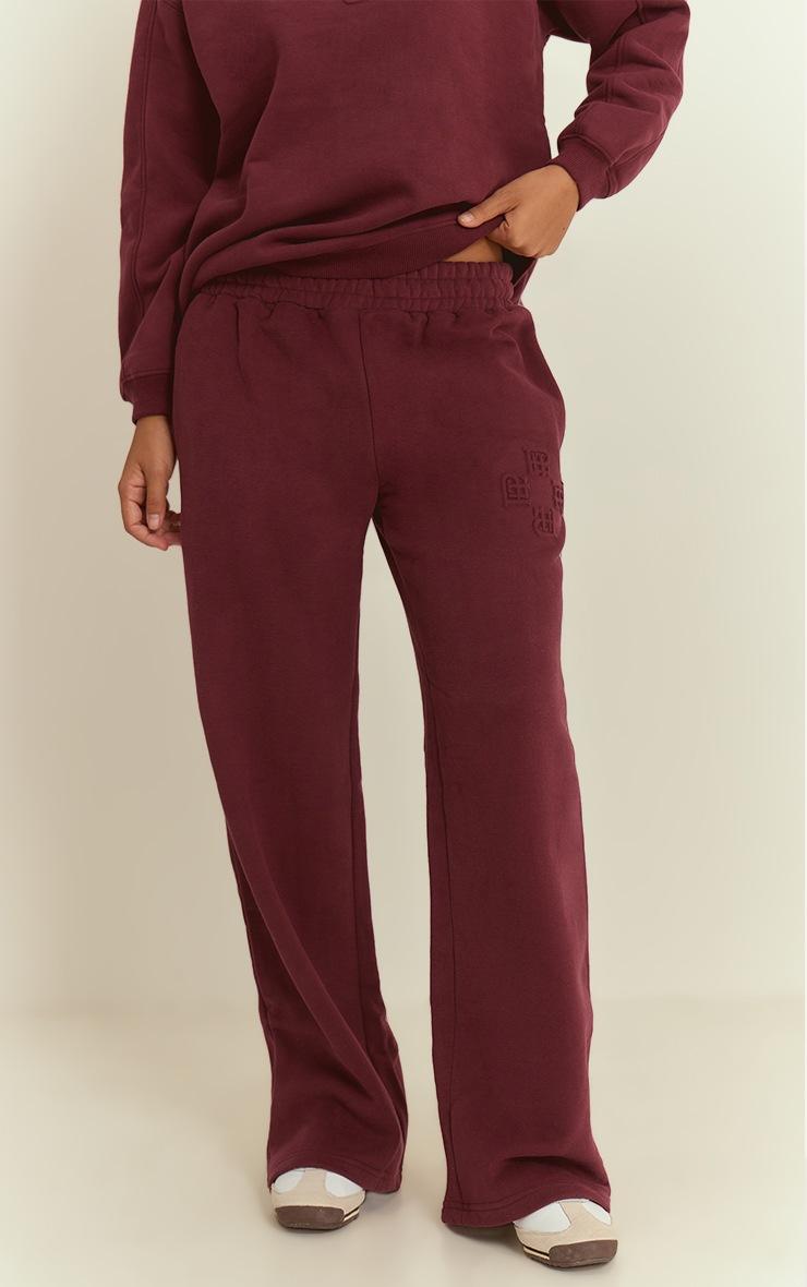 Pretty Little Thing Wine PLT Embossed Wide Leg Sweatpants