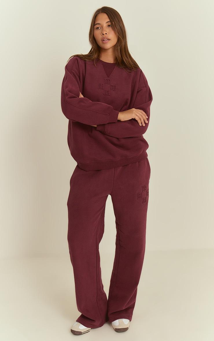 Pretty Little Thing Wine PLT Embossed Wide Leg Sweatpants